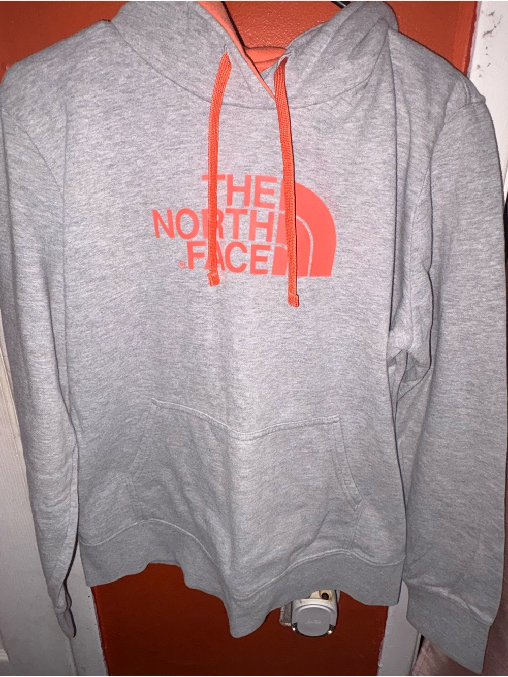 The North Face Gray Hoodie with Coral Logo and Drawstrings